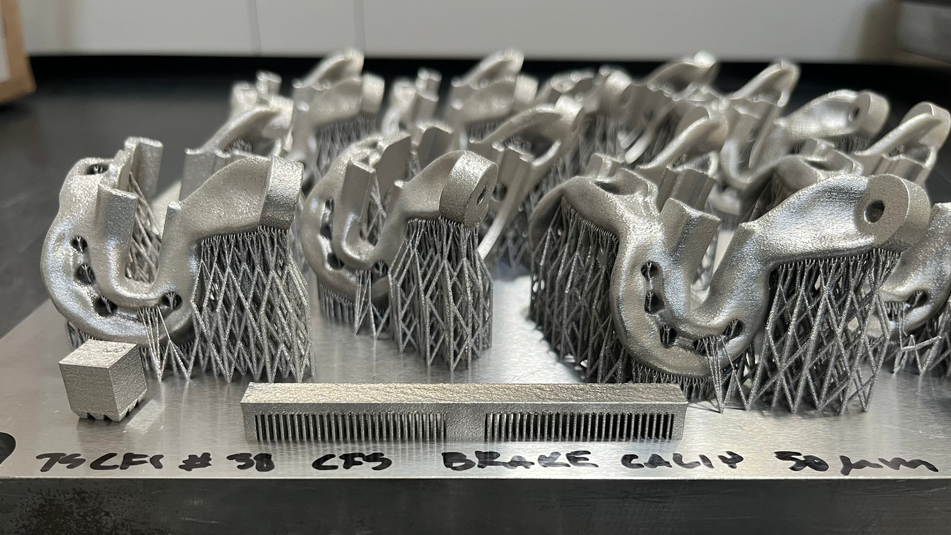 Metal parts produced with additive manufacturing.